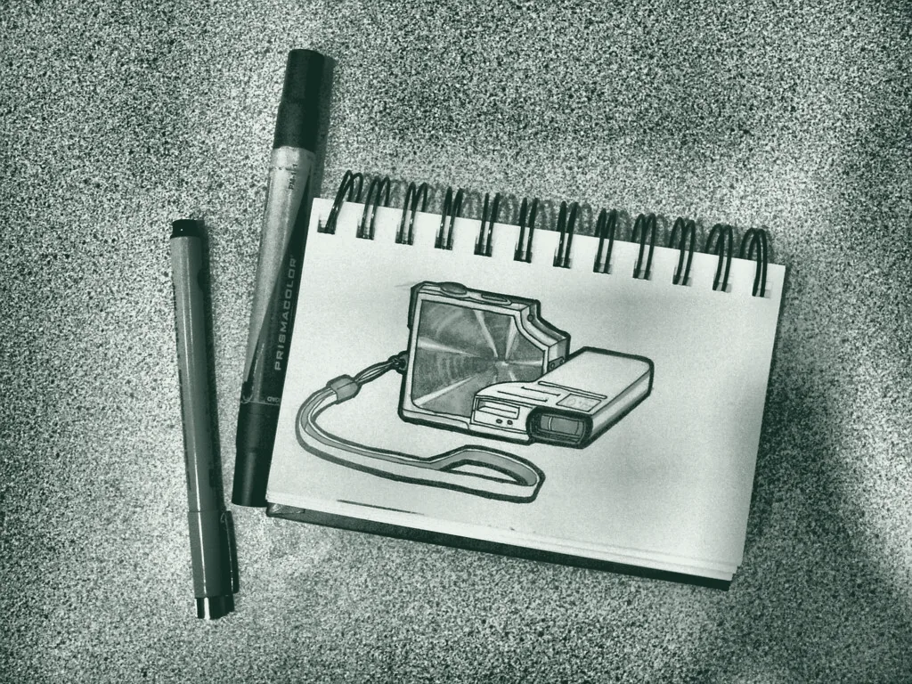 Sketchbook and pencil